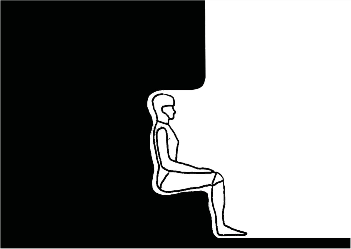 Tegneserierute: en figur ser inn i et rom med en sort søyle midt i, i perspektiv.
