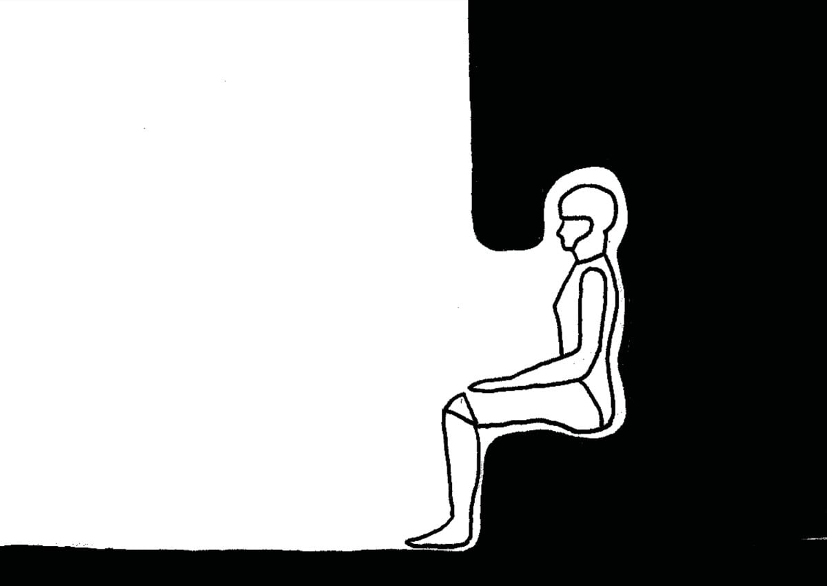 Tegneserierute: en figur står i en smal lysåpning i enden av en mørk gang.